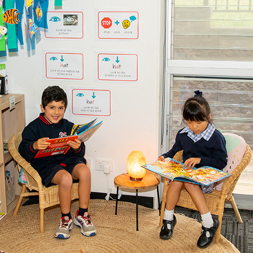 Two students reading books